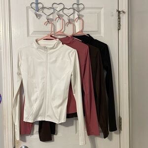 Bundle of 4 long sleeve workout zip ups